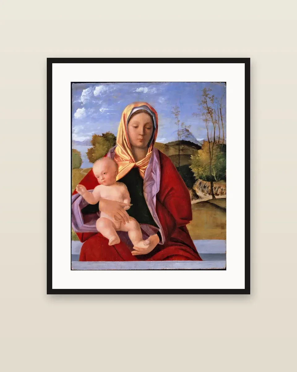 The Madonna and Child in a landscape by Giovanni Bellini, framed