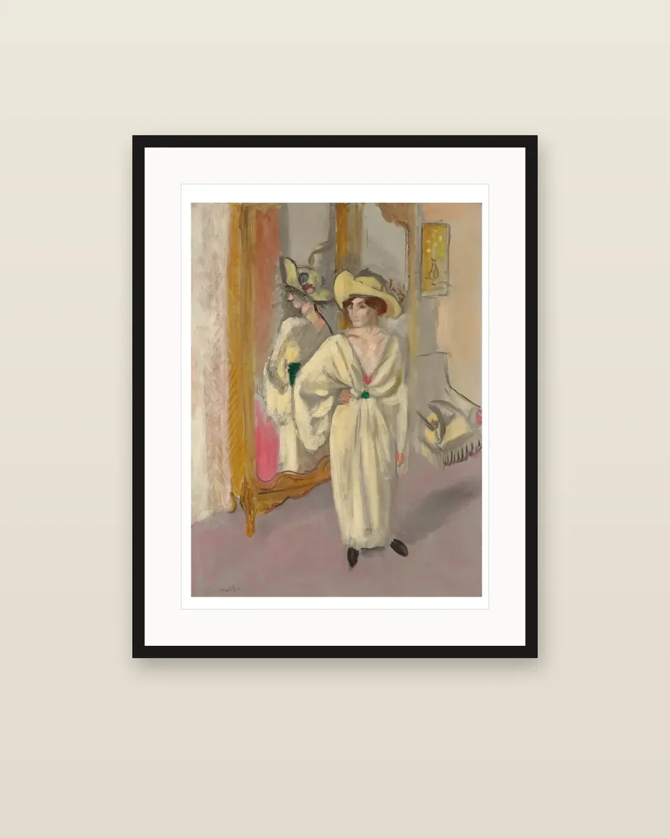 Femme en blanc debout devant une glace by Henri Matisse, framed