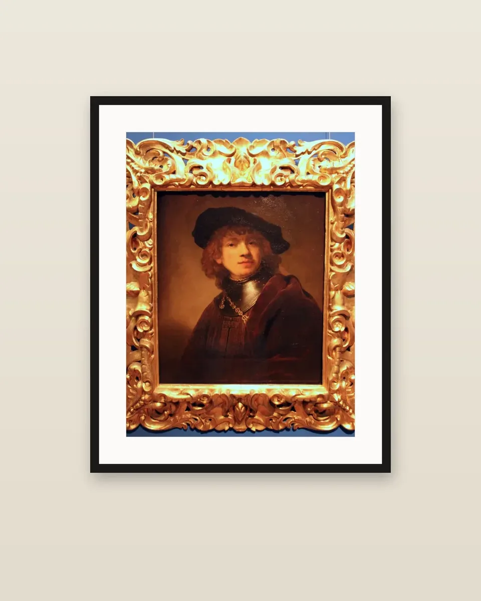A Man in a Gorget and Cap by Rembrandt van Rijn, framed