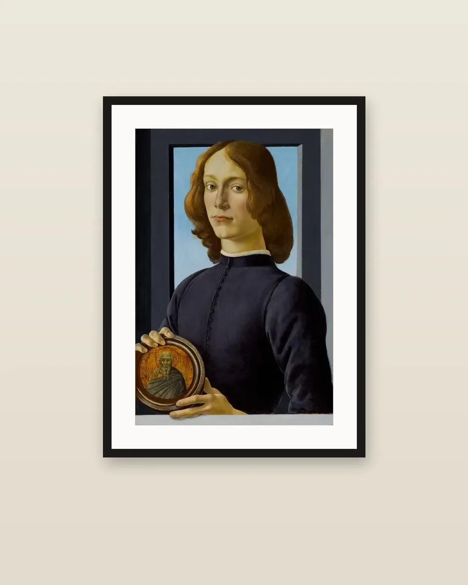 Portrait of a Young Man holding a Roundel by Sandro Botticelli, framed
