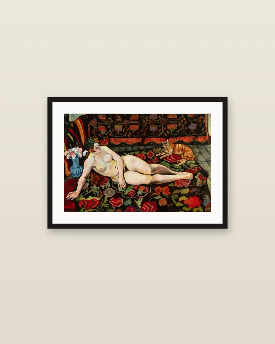 Nu au chat allongé sur une draperie à fleurs by Suzanne Valadon, framed